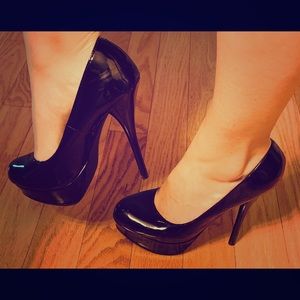 Speed limit 98 black platform stiletto heels.